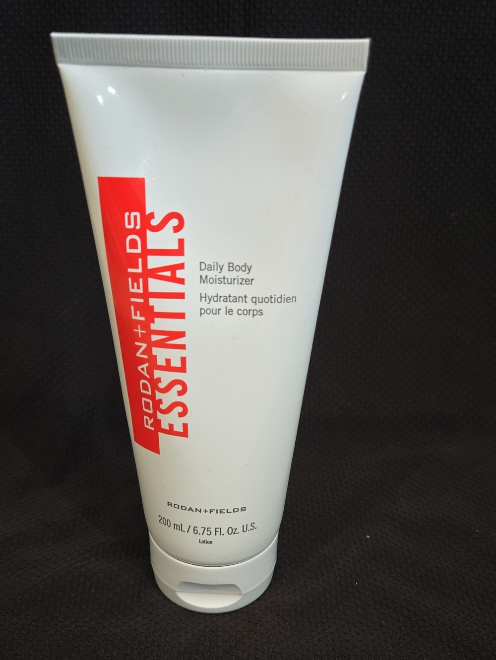 Rodan + Fields White Tube with Red Branding Daily Body Moisturizer